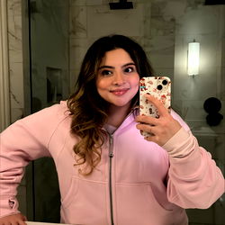 A Female Model Taking a Selfie