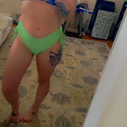 Emily, an OnlyFans model, in a bikini photo