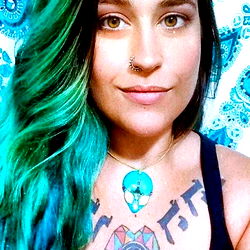 Stunning Tattoo Artist Anne Hoffman with Vibrant Hair and Multiple Piercings - BRAZIL
