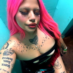 Model with Tattoos and Colorful Hair