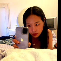 Amanda, OnlyFans Model Posing with Phone