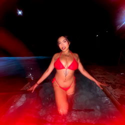 Nani Babi, Erotic Model in Red Swimsuit