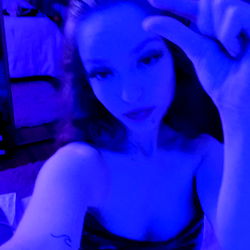 Model Posing for OnlyFans Photoshoot