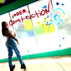 Model Amarola Tru in Backdrop with Under Construction Sign