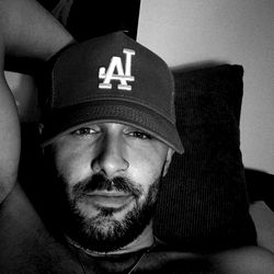 Man in a Hat Resting