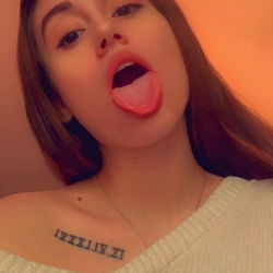 LatinaMami - Playful Model with Tongue Out