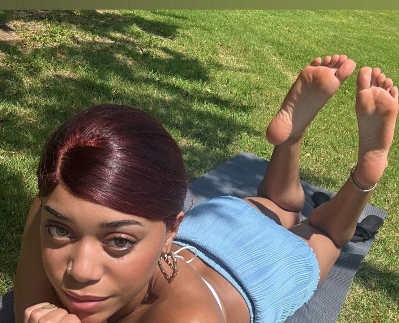 coka’s feet 🦶🏽 photo