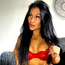 Nikollett: A Stunning Female Model in Red Lingerie