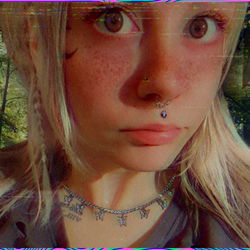 Aesthetic of Kaylee Maree - A Young Model with Tattoos and a Pierced Nose
