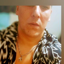 A Man in a VC CUSTOM Shirt