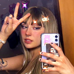 Cherish Mae, the model taking a selfie in her bedroom