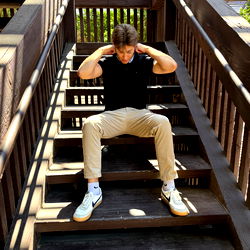 Model ChocolateBlanco on Stairs with Sneakers