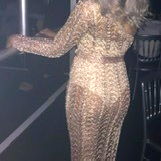 Fashionable Model in Glamorous Dress