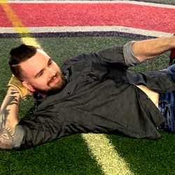 Casual Sports Fan Chillin' On Field