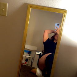 Candid Moment in Bedroom Mirror