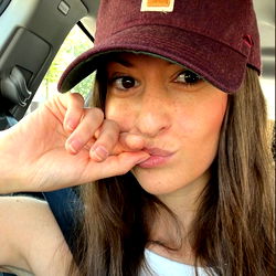 Anna Maré on a Car Ride, Displaying Playful and Confident Expression