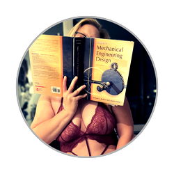 Model with book: Female mechanical engineering student