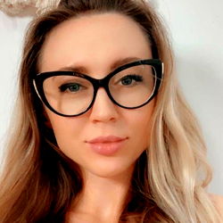 Trendy Blonde Haired Girl in Round Black Eyeglasses