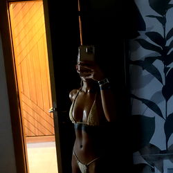 Bikini Model in Bathroom Mirror