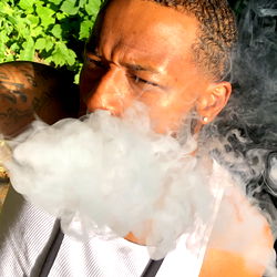 Smoking Rapper Posing for OnlyFans