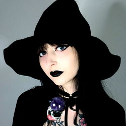 Emo Gothic Model Natalya Poses in a Purple Wig and Shirt