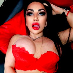 Red Lingerie Model in a Relaxed Pose