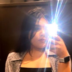 Social Media Influencer Posing for Camera in Hotel Lobby