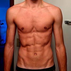 Fitness Model Logan Showcases Abs