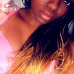 OnlyFans model KissyJ in a playful pose