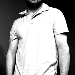 Bearded Man in Polo Shirt Posing