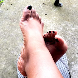 Angela Cherry: A Relaxing Moment with Flip Flops