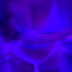 Blurred Model Sasha's Purple and Blue Light Show