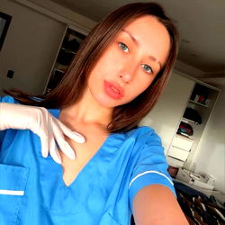 Young Female Nurse in Uniform, Selfie in Hospital Gown