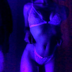 Gorgeous OnlyFans Model in Purple Lighting