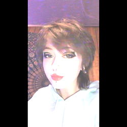 Young Woman with Tattoos and Piercings