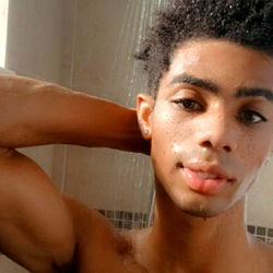 A young adult male taking a shower, sharing from OnlyFans