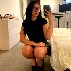 Ana, a fashionable model from the UK posing in a room.