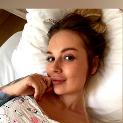 Mia, the adorable pet model with tattoos 🐾