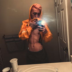 Fit and Colorful Gym Attire in Bathroom Mirror