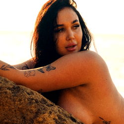 Nude Woman on Rocky Outcrop