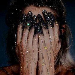 Artistic Self-Portrait with Glitter Face