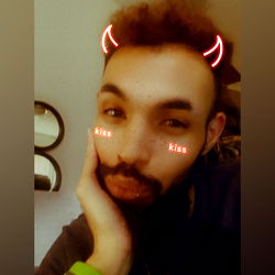 Anonymeiss with a devilish smirk