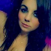 A captivating image of a model with her hand on a surface