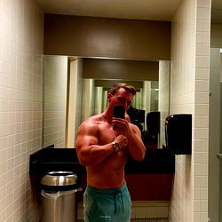 Model in Fitness Center Mirror