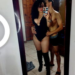 Erotic Model Pareja Caliente in Playful Scene with Partner