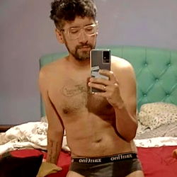 Semi-Attired Model in a Bedroom