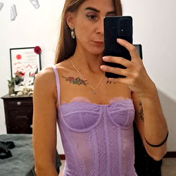 Model in a Purple Ruffle Crop Top