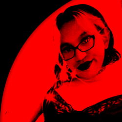 Red-haired female figure in a black dress with red makeup, possibly related to the image's red glow and atmosphere