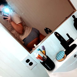 Stylish OnlyFans Model Kate in Home Bathroom