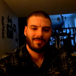 A Young Man with a Beard, Shirtless, in a Colorado Setting